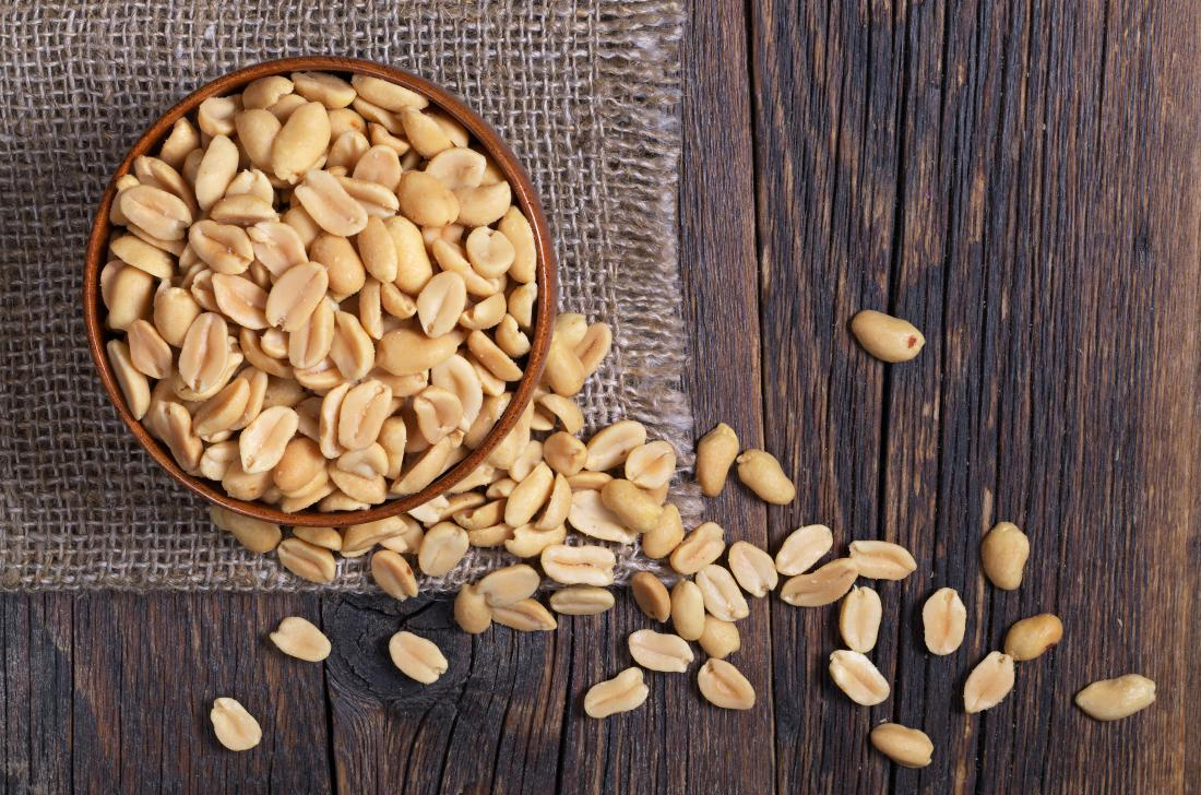Self Photos / Files - peanuts-in-a-bowl-on-wooden-table-top-down-view